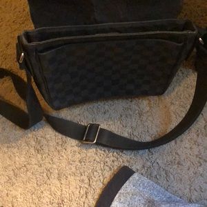 Loui Vuitton satchel. (Unisex)